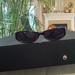 Gucci Black Oval Sunglasses Sleek Minimalist Design